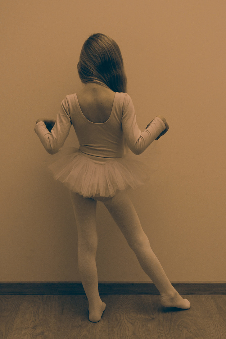 sepia photo of female ballerina