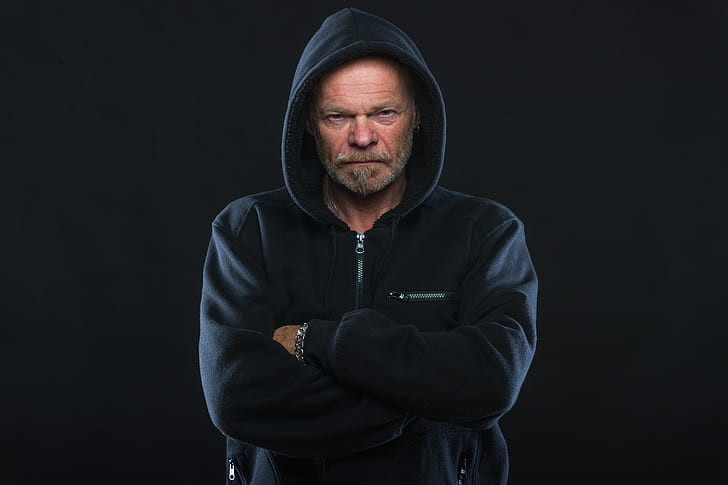 man with black zip-up hoodie photo