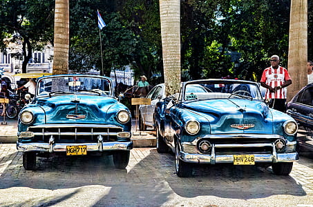 Blue Convertible Vintage Car Parked during Daytime
