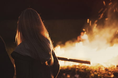 girl facing the fire