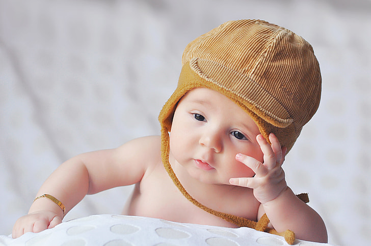 Young baby wearing hat