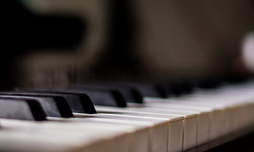 selective focus photography of piano tiles