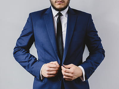 man in blue formal suit jacket