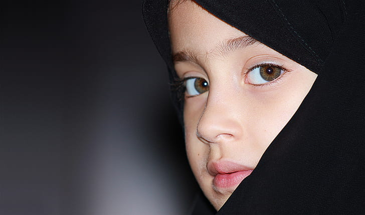girl wearing black hijab headdress