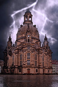 brown cathedral with lightning