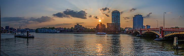 ship near on city in golden hour photography
