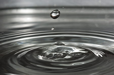 water droplet creating ripple