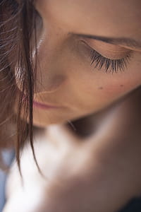 selective focus photo of woman's face