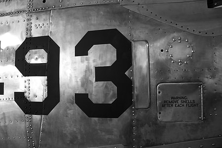Close-up shot of an old military aircraft, image captured at Duxford Air Museum