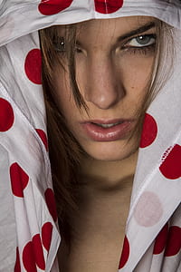 woman wearing white and red polka dot hoodie