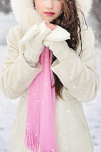 woman wearing white snow hoodie