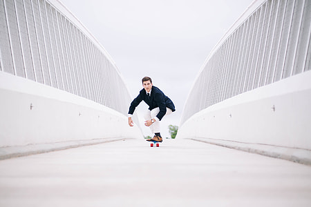 man in skateboard during daytime