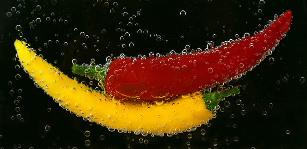 two red and yellow chillis