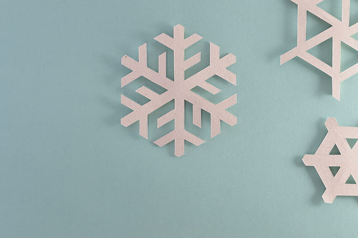 white wooden snowflake wall decor