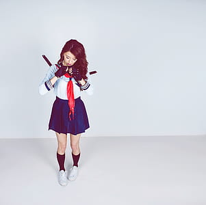 Woman Wearing School Girl Costume