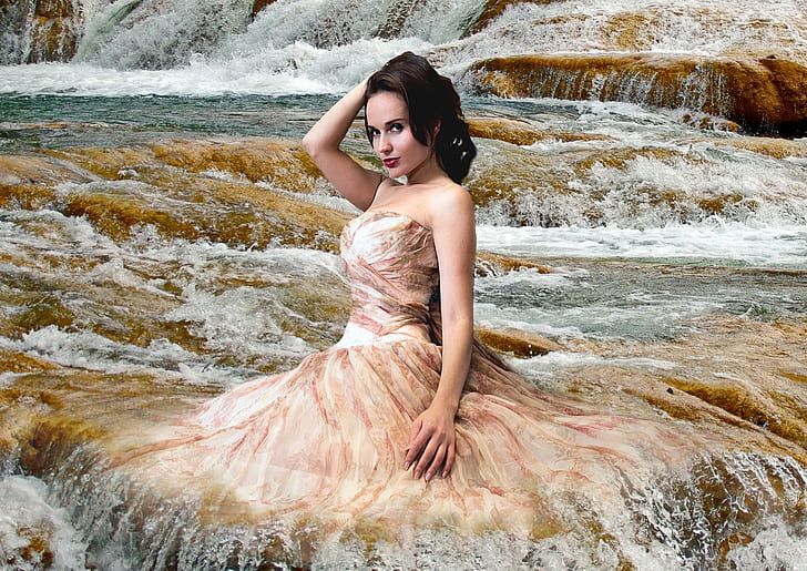 woman in brown dress on waterfalls