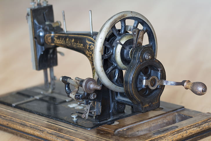 black sewing machine on table