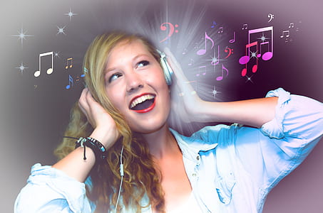 woman wearing gray corded headphones with musical notes