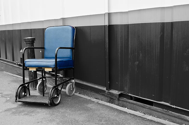 empty blue and black transit wheelchair