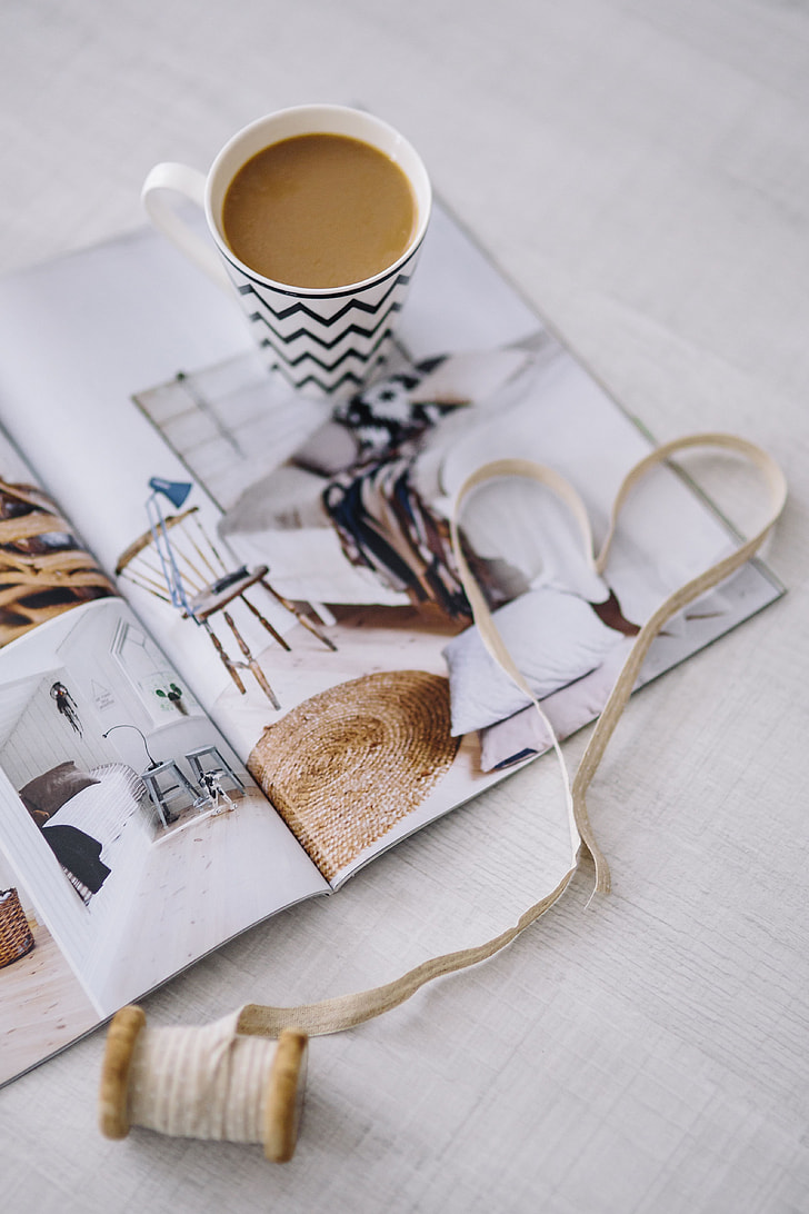 Coffee with home decor magazines