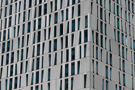 gray concrete glass high-rise building