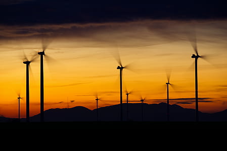 silhouette of windmills