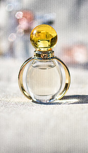 yellow glass perfume bottle