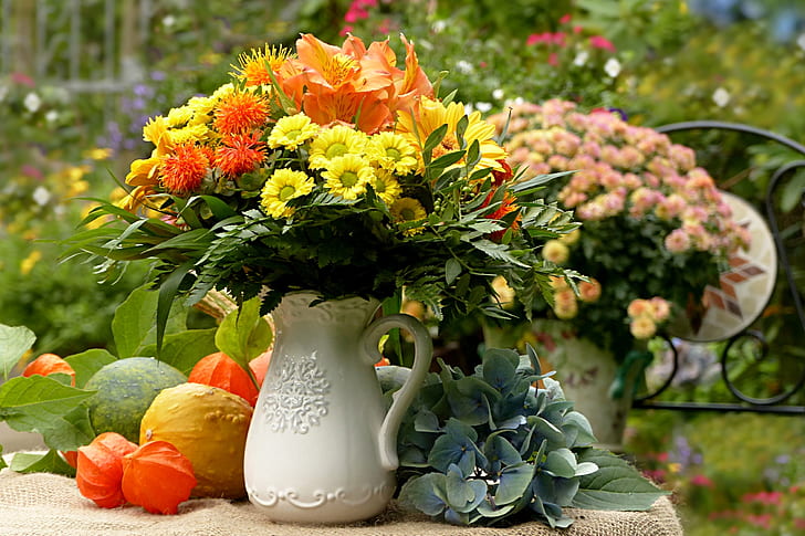 orange lilies and yellow mums centerpiece