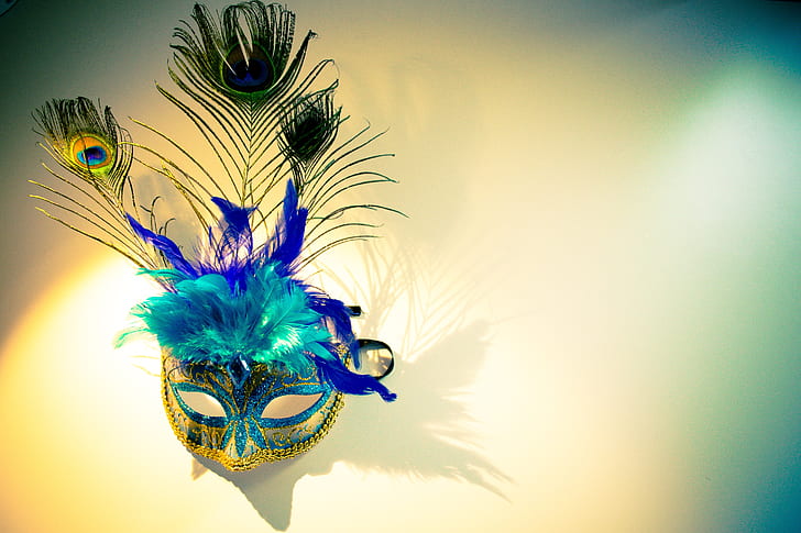 blue and green peacock feather design mask