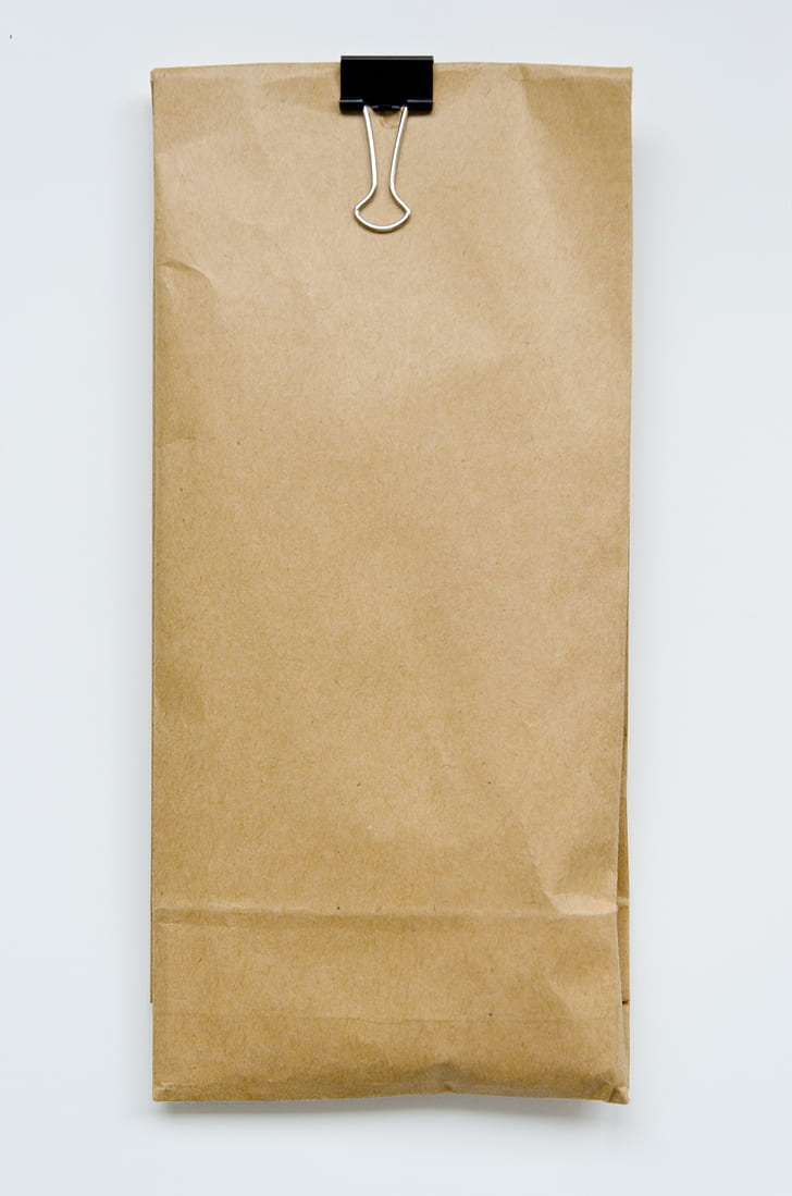 beige paper pack with white background