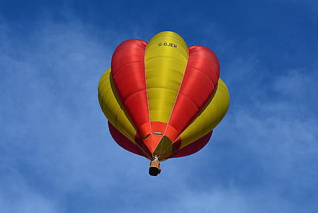 Yellow and Red Hot Air Balloon in Sky