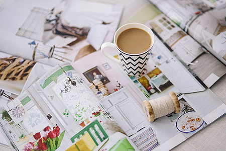 Coffee with home decor magazines
