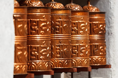 photo of copper-color canisters