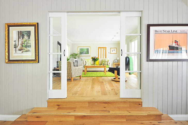 white wooden door to living room furniture set