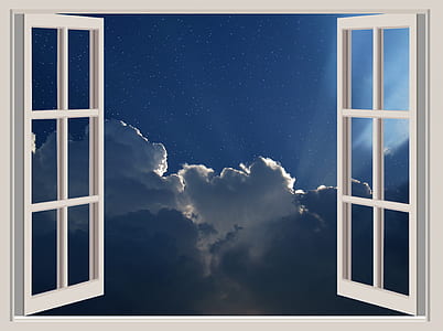 white French door showing clouds