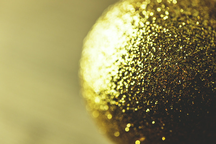 Closeup shot of a gold Xmas ball decoration. Image captured with a Canon DSLR
