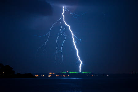 lightning strike near body of water