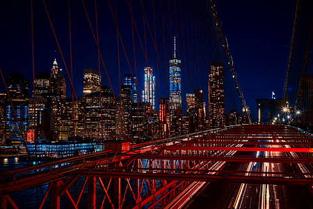 red metal bridge at night