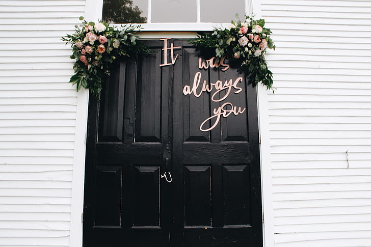 black wooden double doors with it was always you decor