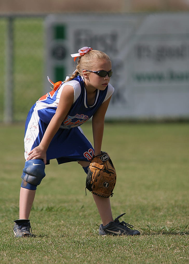Girl Holding Brown Leather Baseball Mitt