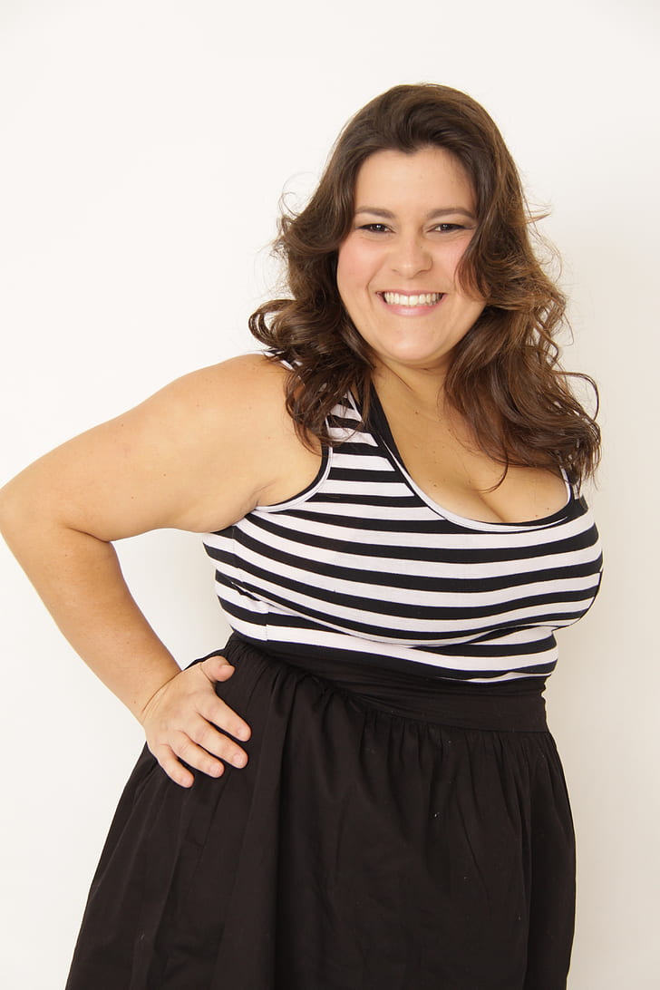 woman wearing white and black striped dress