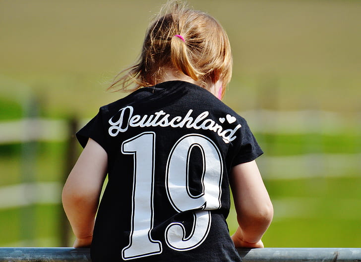 Girl Wearing Deutschland 19 Black T Shirt during Daytime