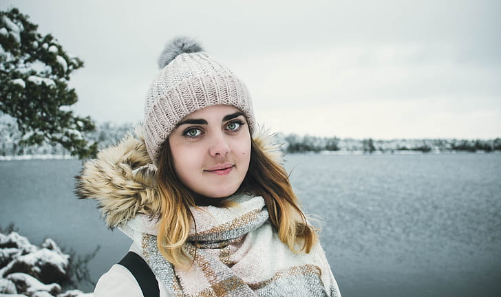 Woman Wearing White Bobble Hat and Jacket