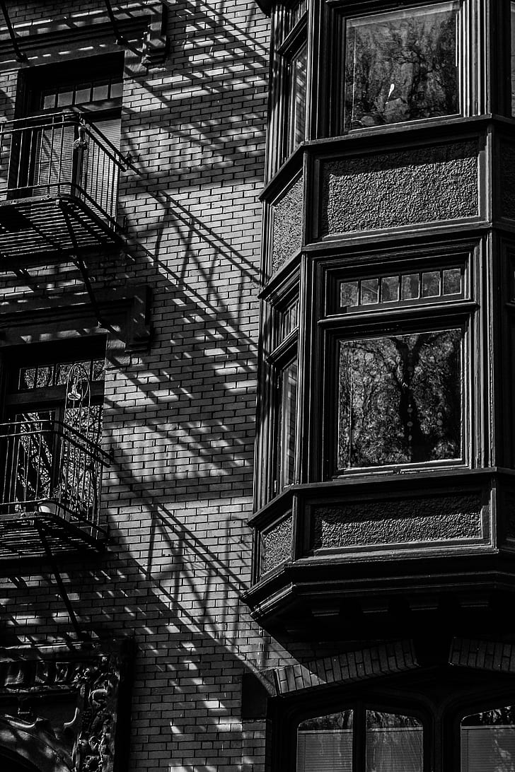 greyscale photo of residential building