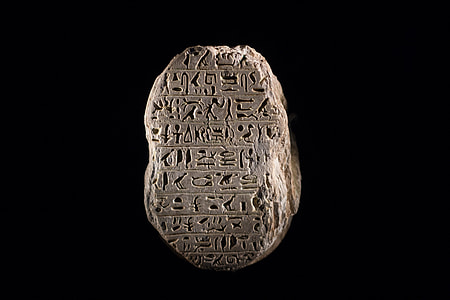 oblong gray hieroglyph tablet