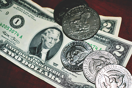 Cash bank notes and coins of US dollar currency