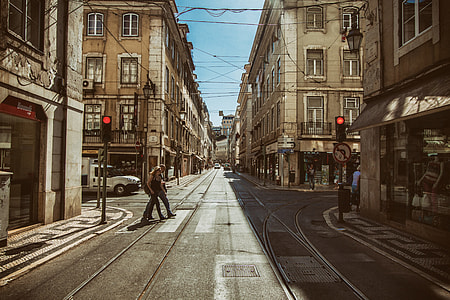 Street shot showing the red lights at a traffic signal in Lisbon, Portugal