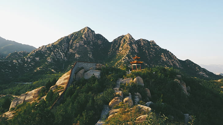 pagoda on mountain range photograph