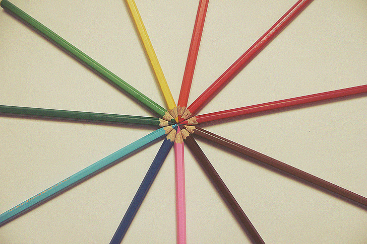 Coloured art pencils on a desk