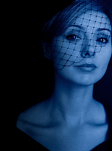 woman wearing black face net